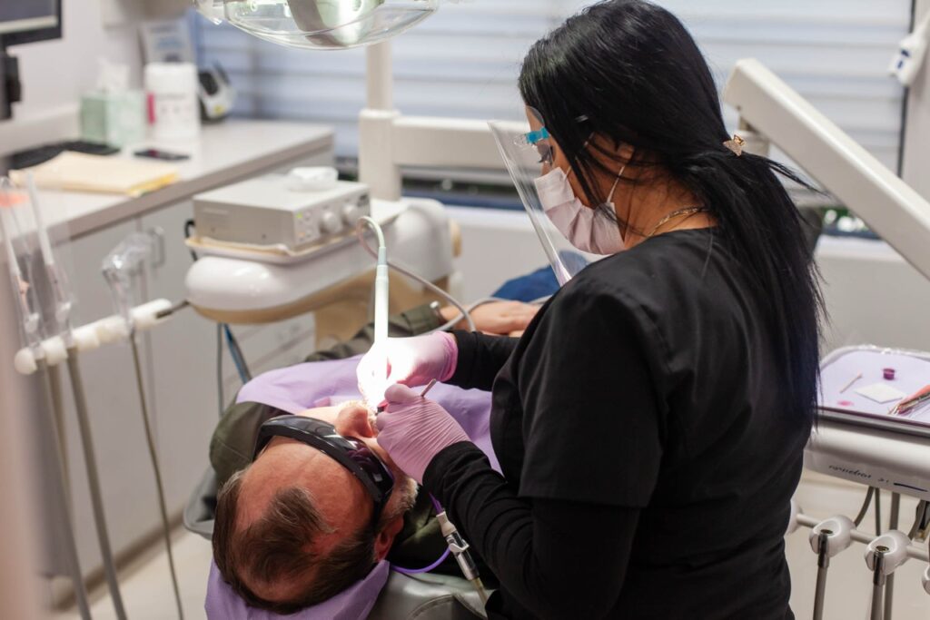 Close-up of professional teeth cleaning in progress at A-Dental Center in North Hollywood