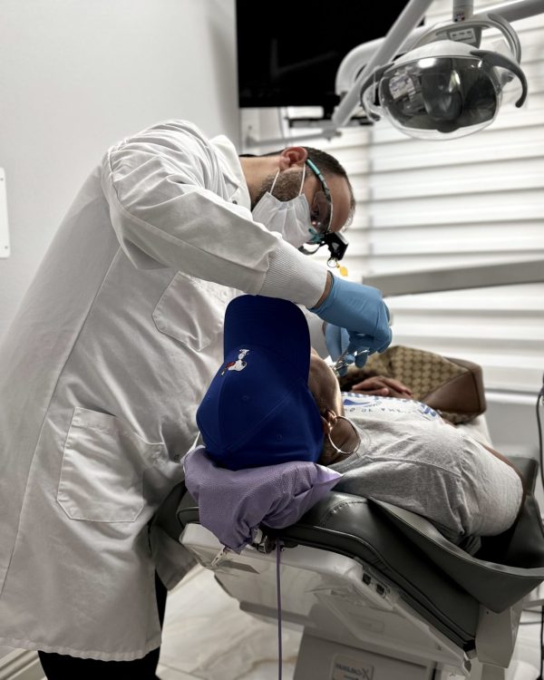 Dr. Elzayat performing dental procedure at A-Dental Center North Hollywood